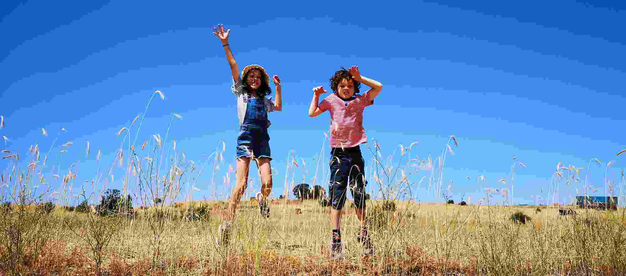 Happy children jumping up